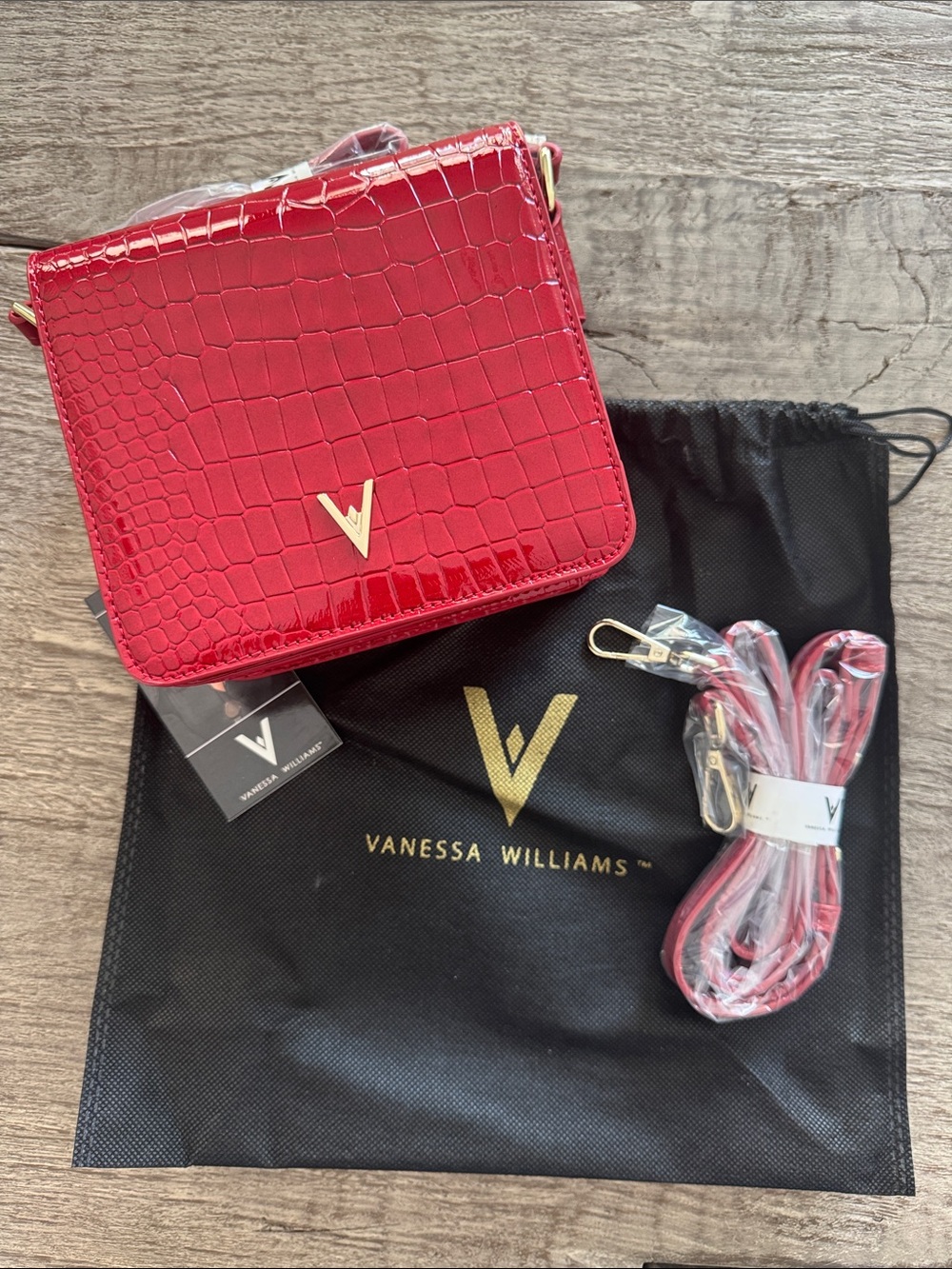 NWT Vanessa Williams Red crocodile-embossed vegan leather crossbody bag.